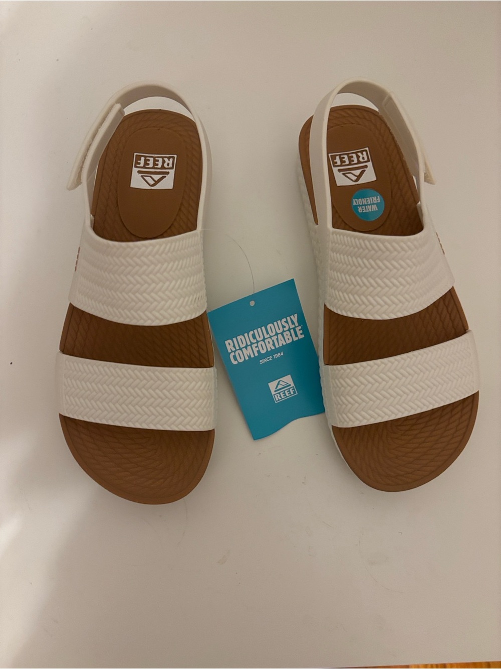 Reef women’s White Strappy Sandals with Brown Footbed